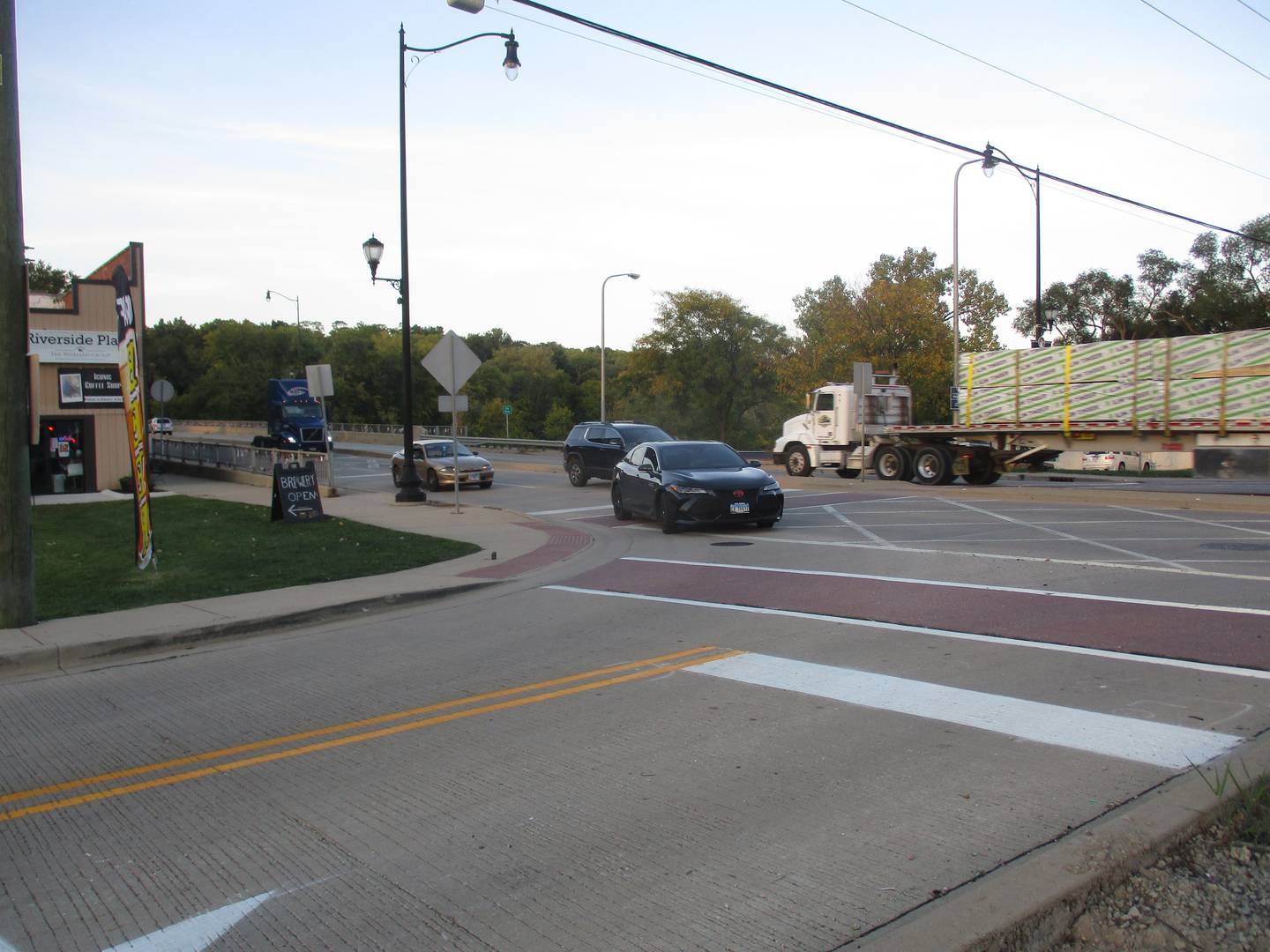 A car turns off Route 47 onto Hydraulic Avenue in downtown Yorkville in his view looking northeast.