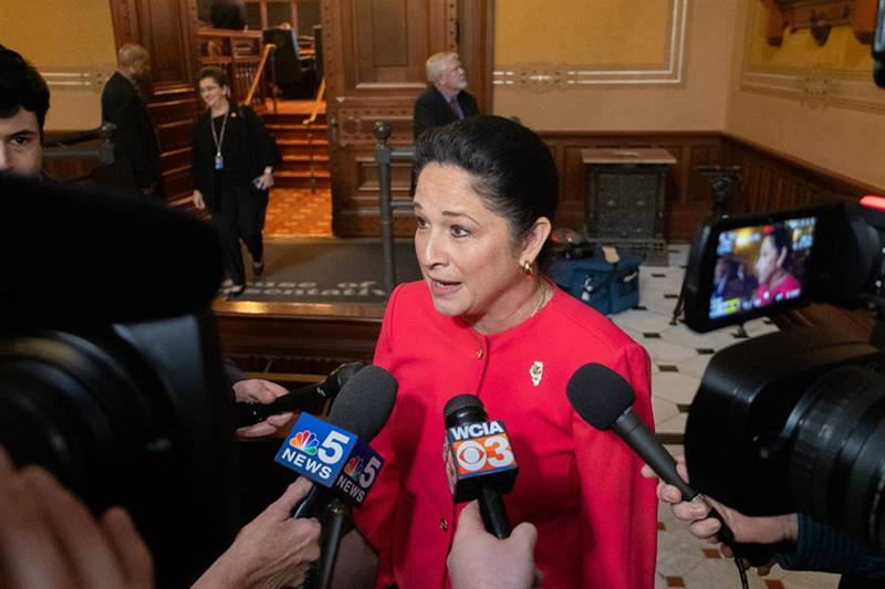 Illinois Comptroller Susana Mendoza – the state’s chief financial officer – is swarmed by reporters for her reaction to Gov. JB Pritzker’s proposed budget moments after leaving the House of Representatives chambers.
