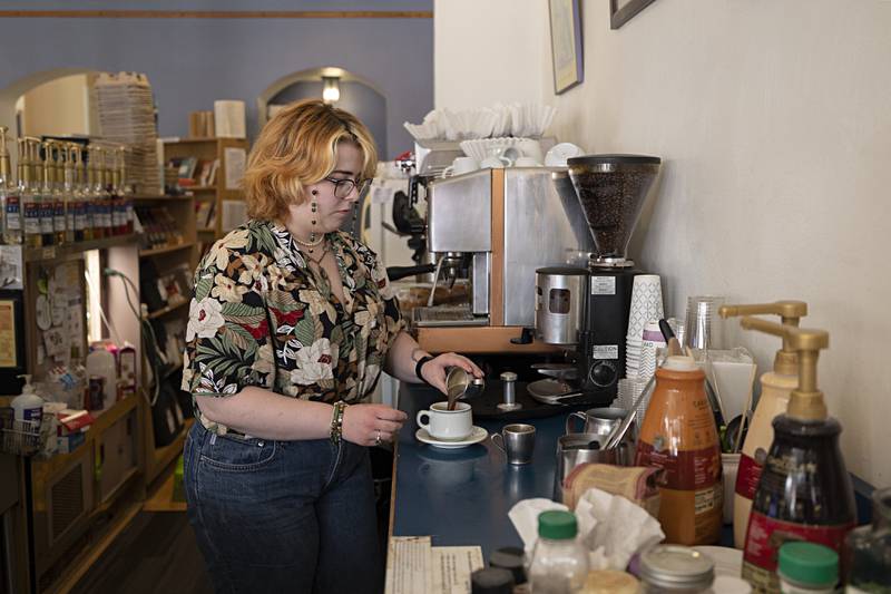 Elsie Gordon whips up an espresso Saturday, July 6, 2024 at Books on First in downtown Dixon. The book store/coffee shop received a small business grant which will go towards replacing the aging espresso machine.