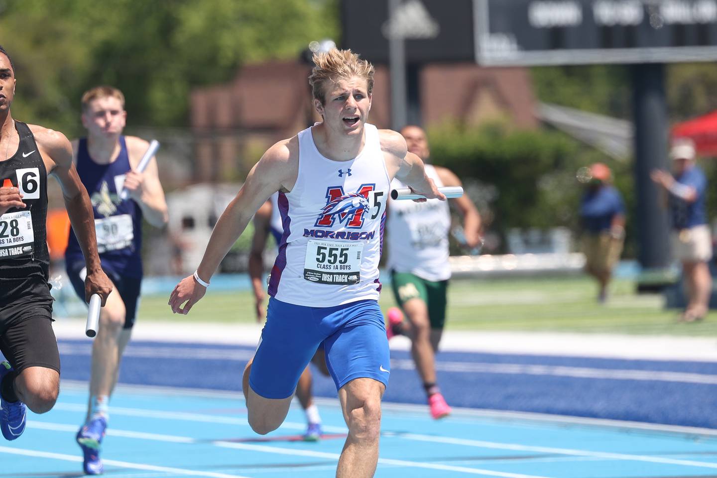 Morrison’s Brady Anderson lunges forward for 1st place in the Class 1A 4x100 Meter Relay State Championship on Saturday, May 25, 2024 in Charleston.