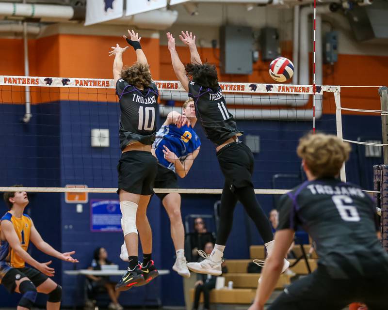 Lyons Sam Levinson (8) spikes the ball during Oswego Sectional final between Downers Grove North at Lyons.  May 30, 2023.