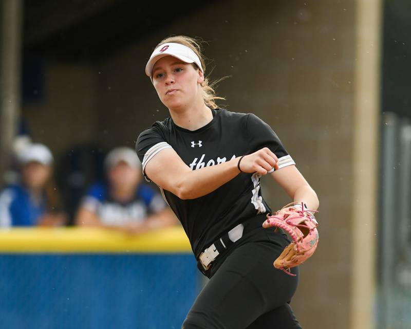 Glenbard North's Tru Medina (34) throws out a Wheaton North runner at first base during the game on Monday May 13, 2024, held at Wheaton North High School.