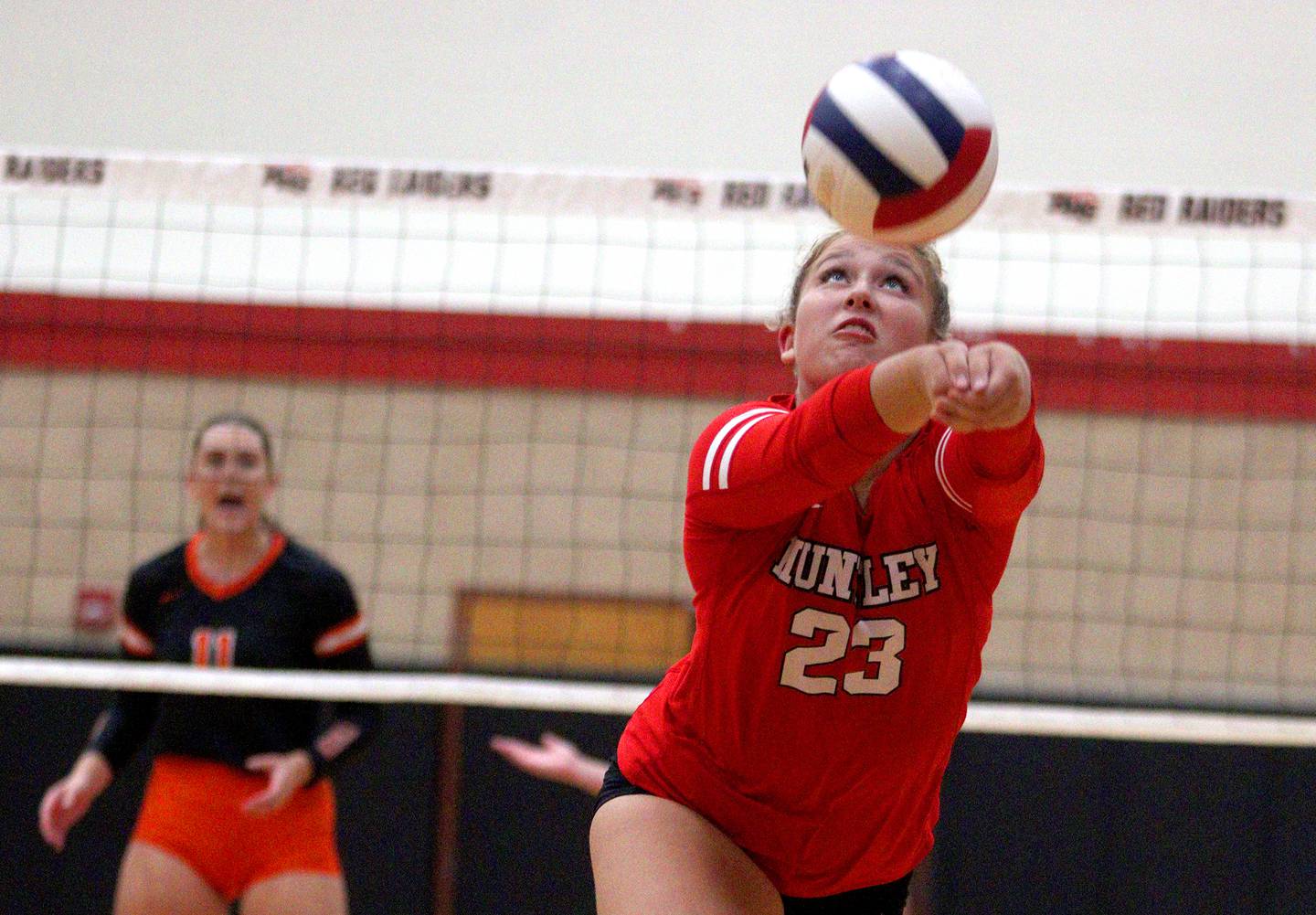 Huntley’s Abigail Whitehouse passes the ball against Crystal Lake Central during a Fox Valley Conference volleyball match on Tuesday, Aug. 27, 2024, at Huntley High School.