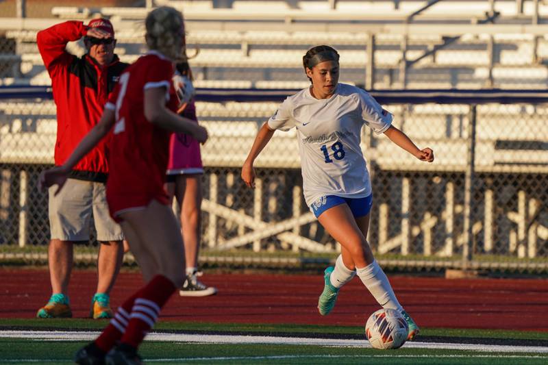 St. Charles North's Juliana Park (18) plays the ball against Naperville Central during a Class 3A St. Charles North Supersectional soccer final match at St. Charles North High School on Tuesday, May 28, 2024.