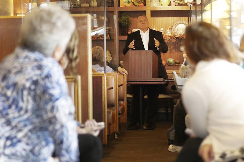 Thomas DeVore, the Republican candidate for attorney general, talks about the SAFE-T Act Wednesday, Oct. 12, 2022, during a stop in his SAFE-T Act Tour at the Around the Clock Restaurant, 5011 Northwest Highway in Crystal Lake. DeVore was joined by Cary Police Chief Patrick Finlon, McHenry County State's Attorney Patrick Kenneally and other officials who are critics of the SAFE-T Act.