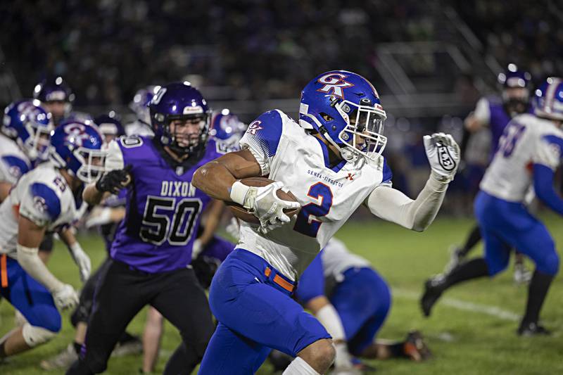 Genoa-Kingston’s Tyler Atterberry looks for running room Thursday, Sept. 14, 2023 in a game at Dixon High School.