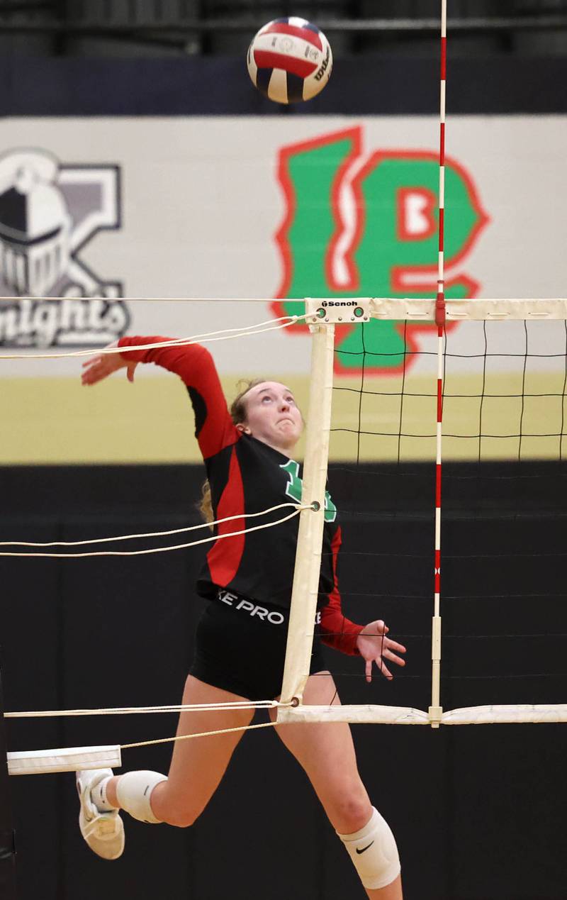 LaSalle-Peru's Katie Sowers spikes the ball during their match Tuesday, Oct. 10, 2023, at Sycamore High School.