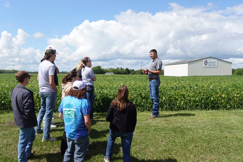 Willard Mott, Illinois Valley Community College ag Instructor, shows students the soybean variety trials Sept. 6, 2024, at the annual Fall Field Day.