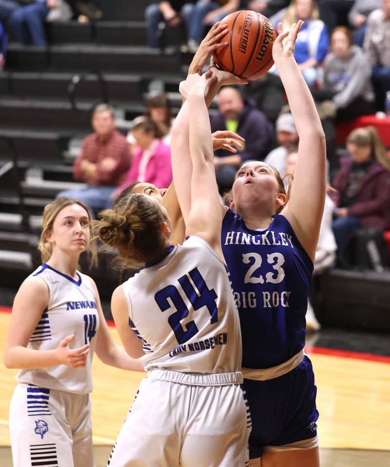 Hinckley-Big Rock's Sami Carlino shoots over Newark’s Oliva Smith Thursday, Jan. 18, 2024, during the Little 10 girls basketball tournament at Indian Creek High School in Shabbona.