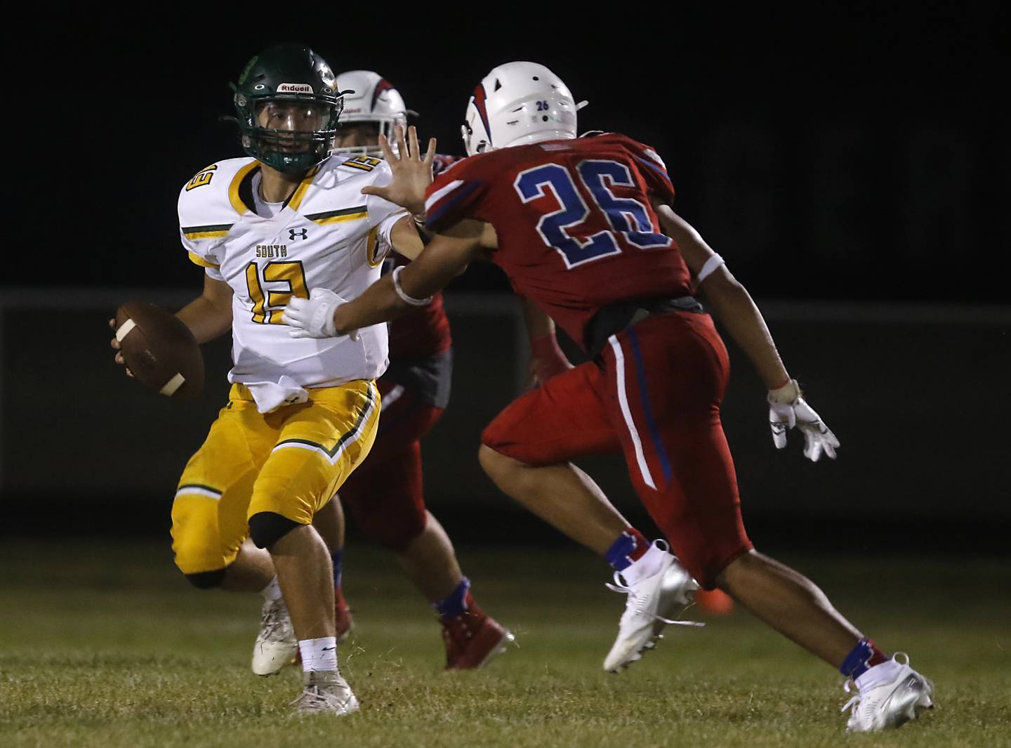 Crystal Lake South's Michael Silvius is sacked by Dundee-Crown's Anthony Jobe during a Fox Valley Conference football game on Friday, Aug 30, 2024, at Dundee-Crown High School in Carpentersville.