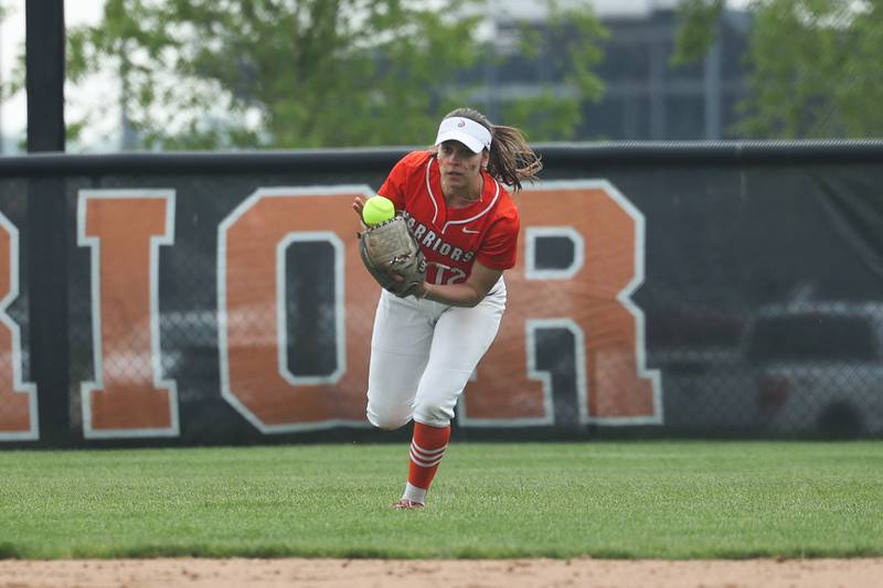 Lincoln-Way West’s Ava Murphy fields a shallow fly ball against Lincoln-Way Central on Tuesday, May 14, 2024 in New Lenox.