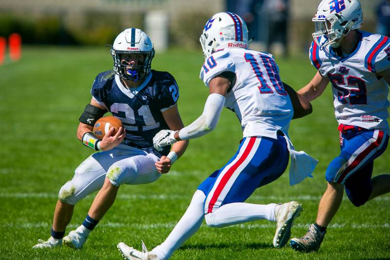 Cary-Grove running back Danny Daigle carries the ball in the second quarter against Dundee-Crown on Saturday at Cary-Grove High School in Cary. Cary-Grove won, 55-15.