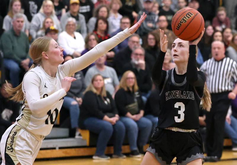 Kaneland's Alexis Schueler shoots over Sycamore's Lexi Carlsen during their Class 3A sectional semifinal Tuesday, Feb. 20, 2024, at Sycamore High School.