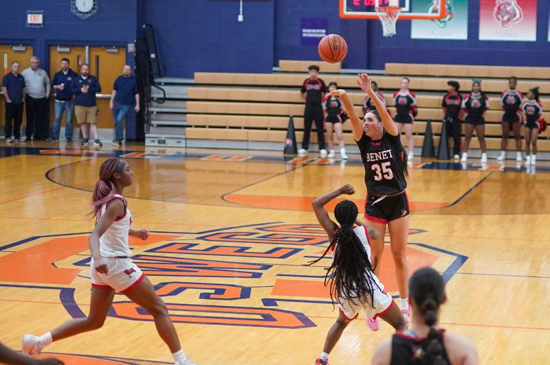 Benet’s Emilia Sularski (35) shoots a three pointer over Bolingbrook's Airyel Jackson (1) during a Oswego semifinal sectional 4A basketball game at Oswego High School on Tuesday, Feb 20, 2024.