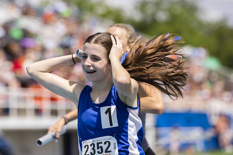 St. Francis’ Erin Hinsdale reacts to her team’s time in the Class 2A 4x800 Saturday, May 18, 2024 at the IHSA girls state track meet in Charleston.