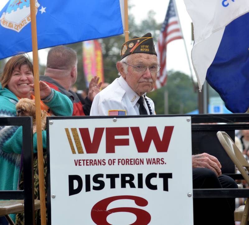 Korean War veteran Stan Eden, of Oregon, rides in the VFW float during the Harvest Time Parade, held during Oregon's Autumn on Parade festival on Sunday, Oct. 8, 2023.