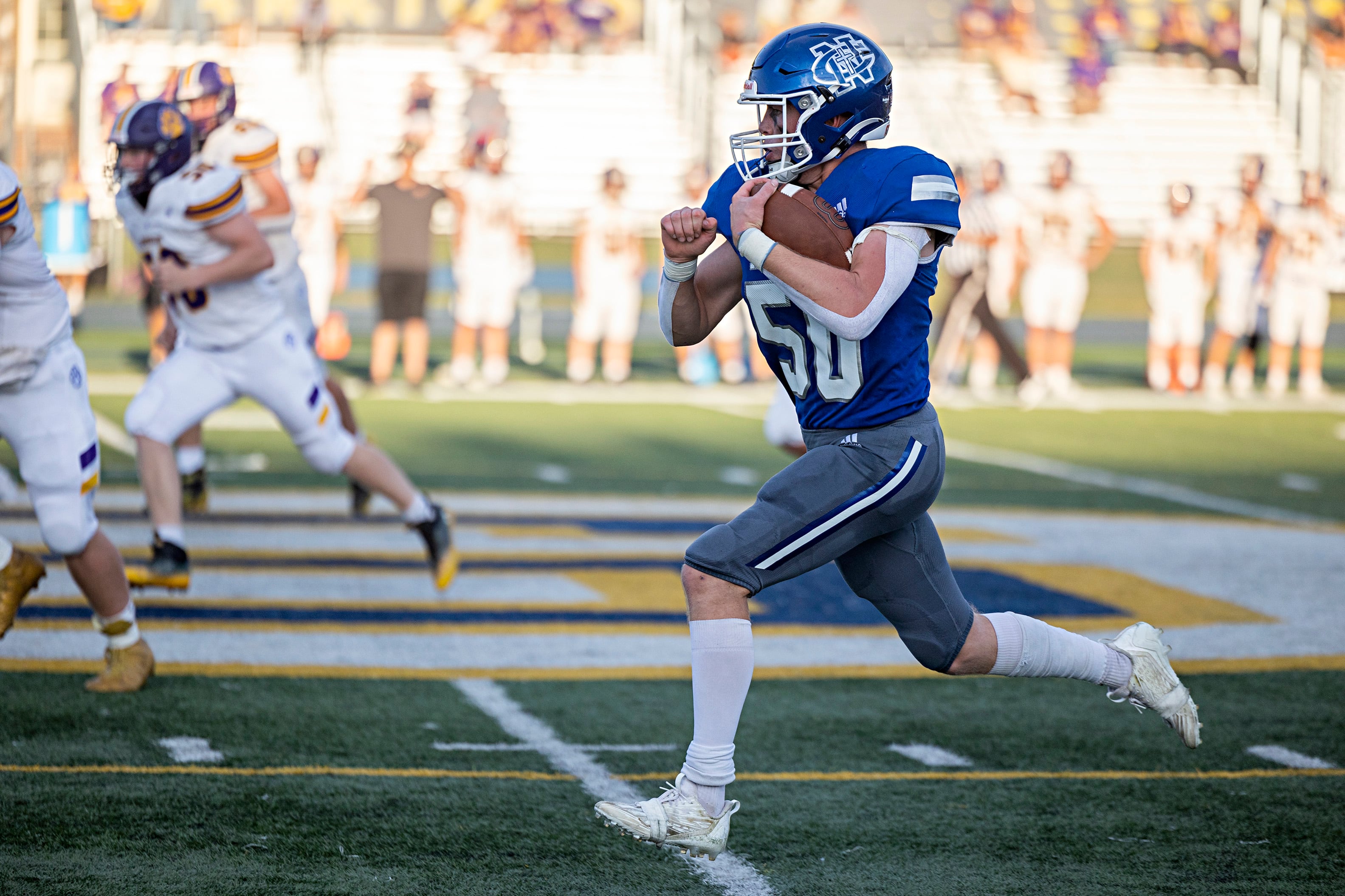 Newman’s Daniel Kelly runs back an interception against Sherrard Saturday, Sept. 2, 2023 in a game at Sterling High School.