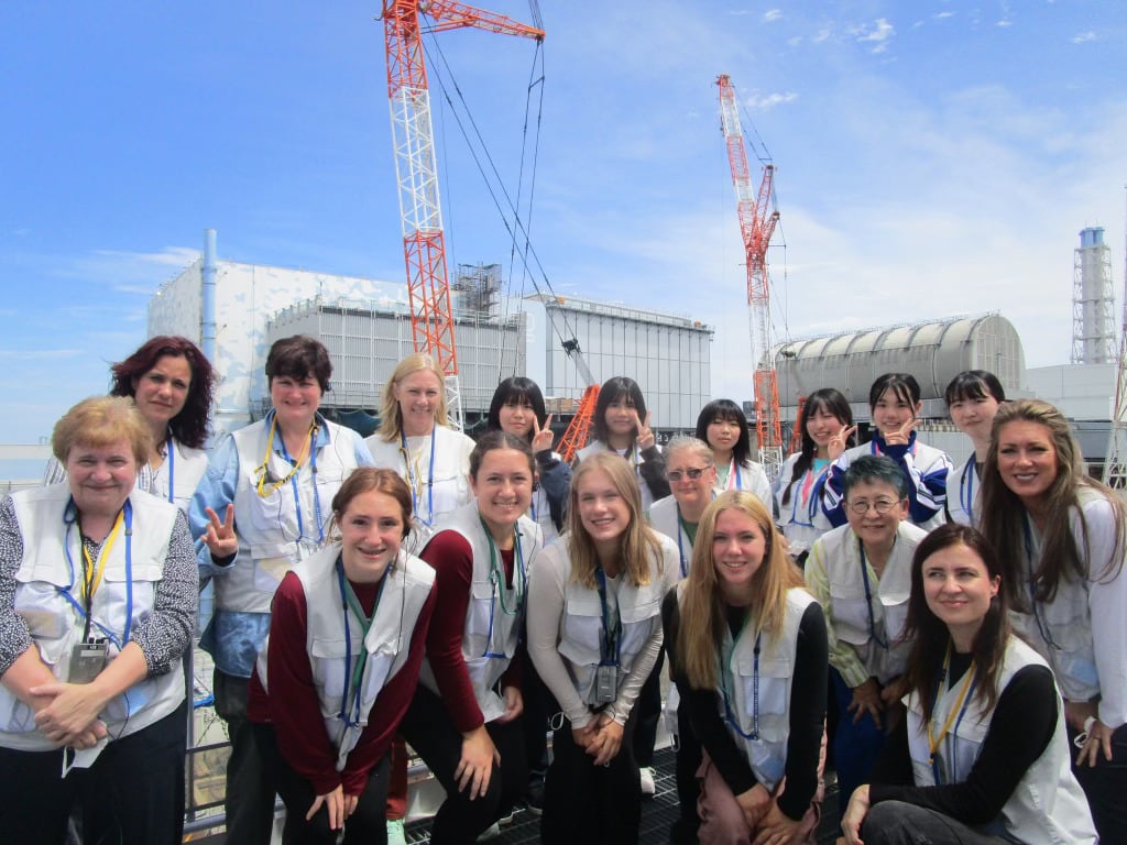 Morris Students with other people in their group on a tour of the Fukushima nuclear plant in Japan.