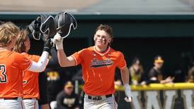 Double duty: Minooka’s Nate George dominating on the field and running wild on the track