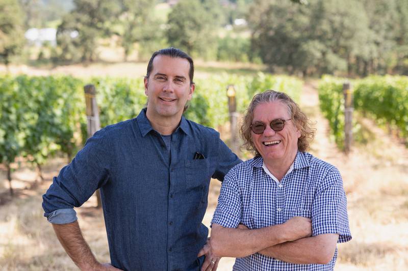 Tim Malone (from left) and Erni Loosen of Appassionata Estate at vineyard.