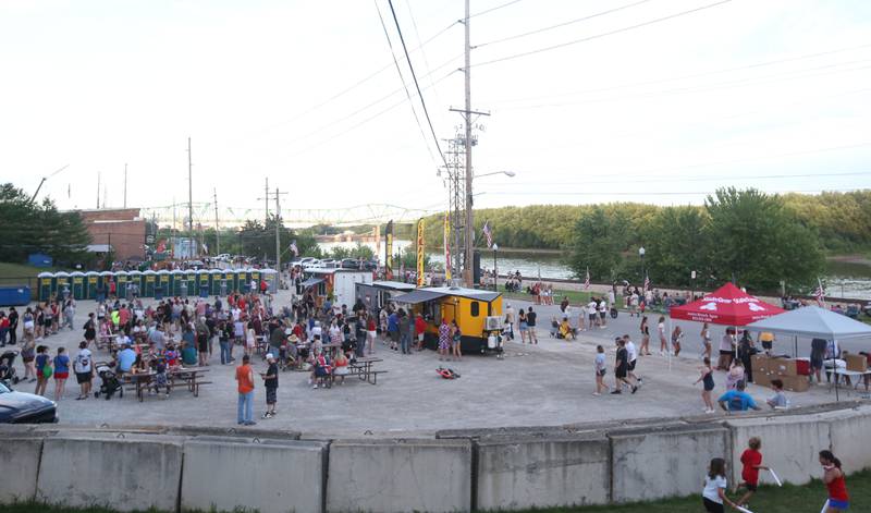 A large crowd gathers along Water Street before the fireworks on Wednesday, July 3, 2024 in Peru.