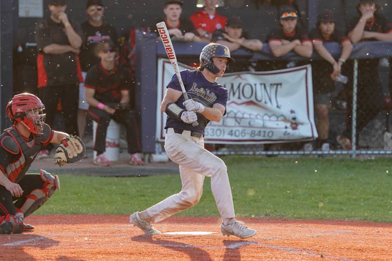 Neuqua Valley's Matt Knapczyk (9) singles against Yorkville during a Class 4A Neuqua Valley Regional semifinal baseball game at Neuqua Valley High School in Naperville on Thursday, May 23, 2024.