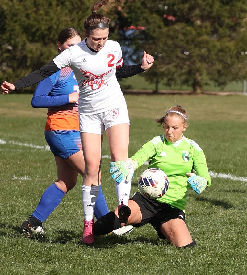 Genoa-Kingston goalie Madelynn Swanson saves the ball as Oregon's Anna Stender looks to score during their game Friday, April 5, 2024, at Genoa-Kingston High School.