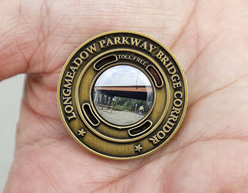 A commemorative coin was made for the opening of the Longmeadow Parkway bridge over the Fox River Thursday, Aug. 29, 2024 in Algonquin.