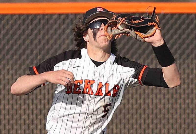 DeKalb's Cole Latimer catches a line drive during their game against Metea Valley Thursday, April 13, 2023, at DeKalb High School.