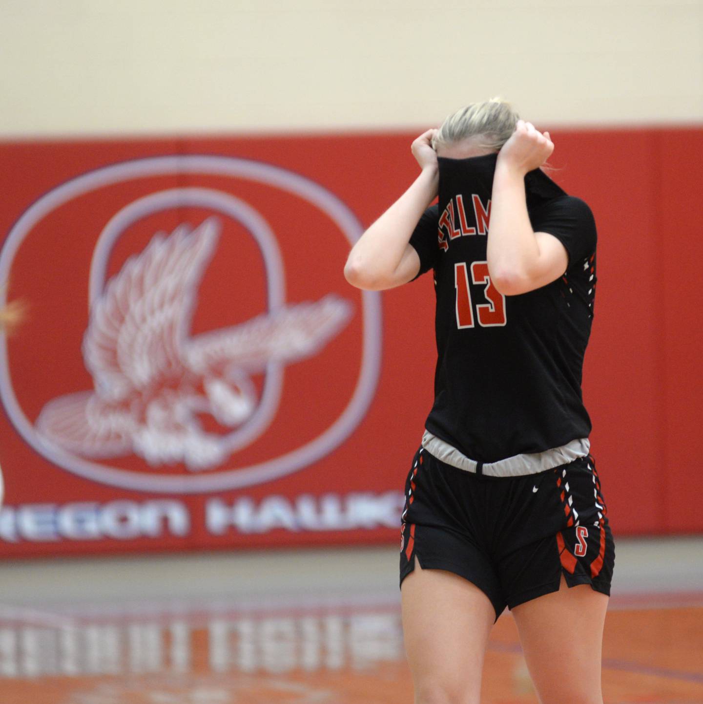 Stillman Valley's Taylor Davidson (15) reacts after the Cardinals fell to Rock Island Alleman 45-36 in the championship of the 2A Oregon Sectional on Thursday, Feb. 22, 2024 at the Blackhawk Center at Oregon High School.