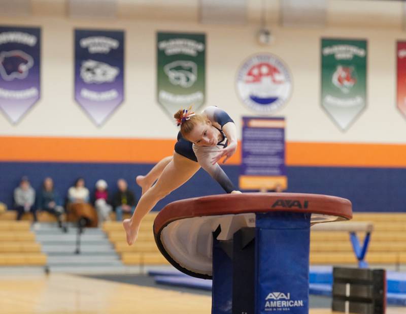 Oswego Co-op's Samantha Phillip competes in the vault during a Oswego Regional Gymnastics Meet at Oswego High School on Monday, Jan 29, 2024.