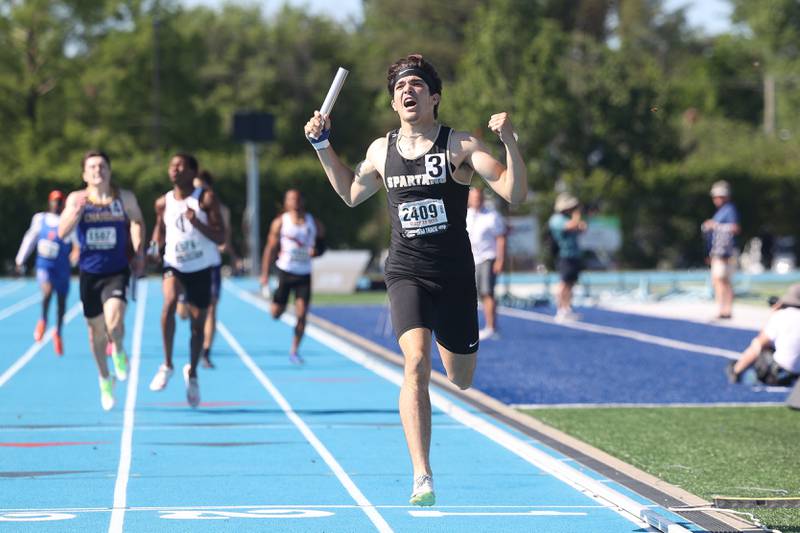 Sycamore’s Eli Crome celebrates an uncontested 1st place finish in the Class 2A 4x400 Meter Relay State Championship on Saturday, May 25, 2024 in Charleston.