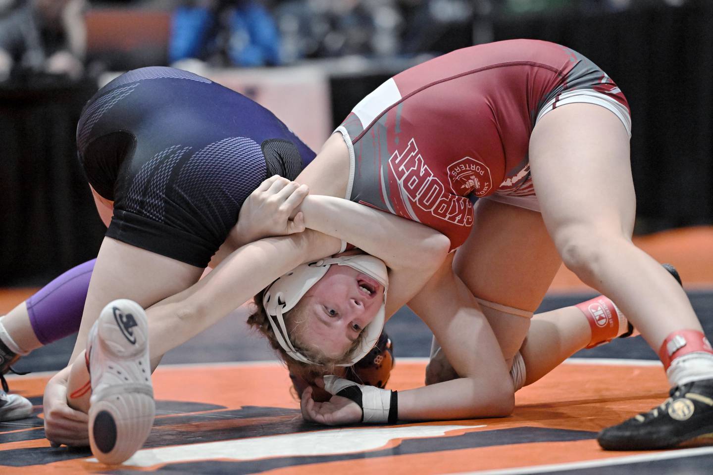 Lockport’s Claudia Heeney wrestles Collinsville’s Taylor Dawson in the 130-pound bout at the girls wrestling state finals at Grossinger Motor Arena in Bloomington on Saturday, Feb. 24, 2024.