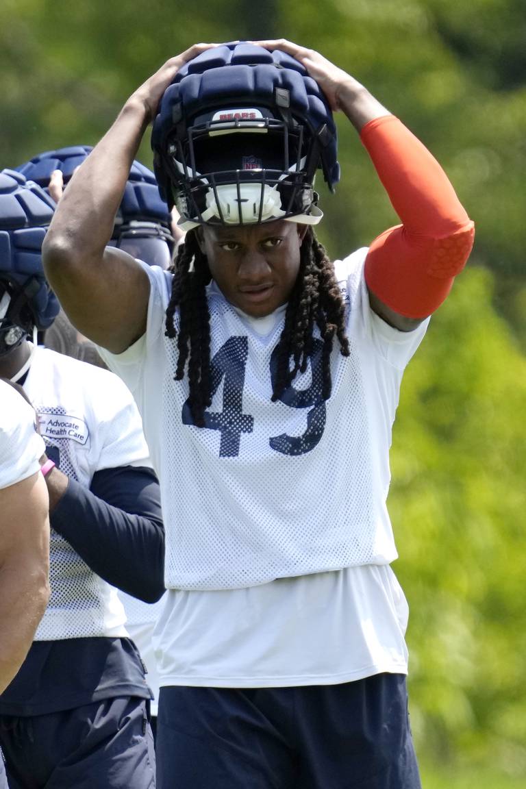 Chicago Bears linebacker Tremaine Edmunds puts on his helmet during the team's OTA practice, Tuesday, May 23, 2023, in Lake Forest.