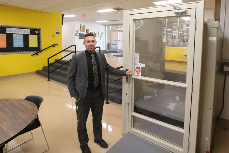 Superintendent Clay Theisinger stands next to a handicapped accessible lift just outside the schools library on Thursday, Sept. 12, 2024 at the Putnam County Jr. High School in McNabb. The school district is looking at closing the Elementary School in Henepin and Jr. High School in McNabb and moving them to the Primary and High School in Granville.