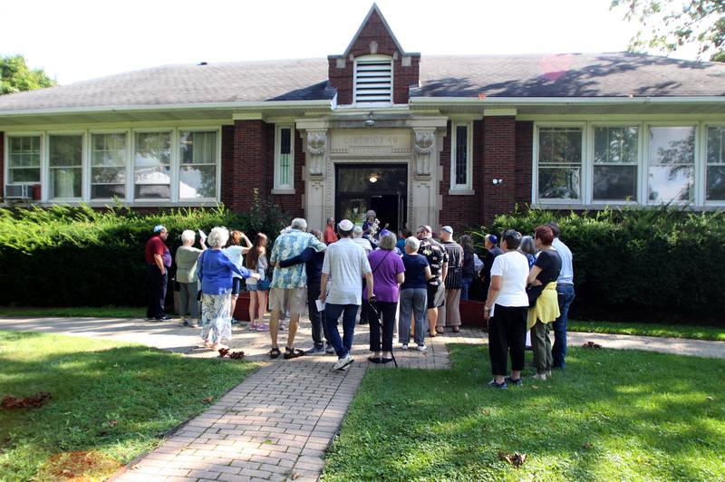 Worship service concludes outside as the McHenry County Jewish Congregation held a deconsecration ceremony at their Ridgefield Road location in preparation for a move to the Tree of Life Unitarian Church in McHenry on Sunday, August 18.