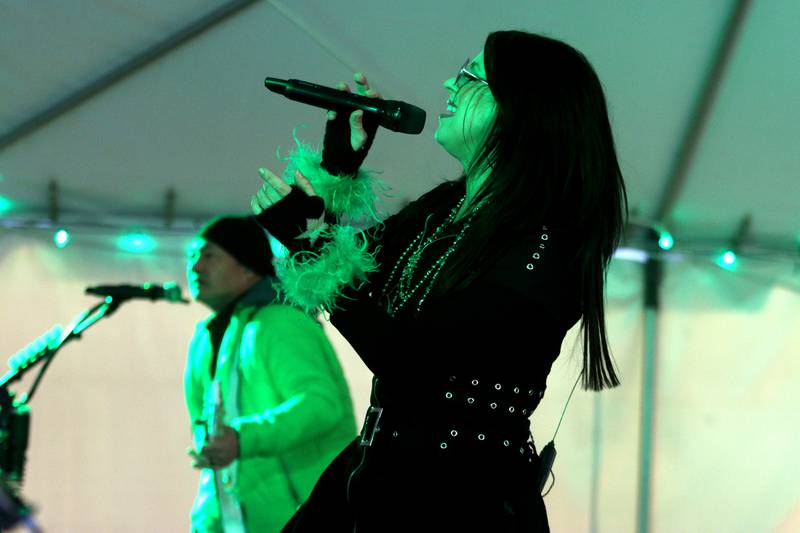 The Vinyl Goldmine musical group entertains at the ShamROCKS the Fox Festival in McHenry Friday, March 17, 2023.