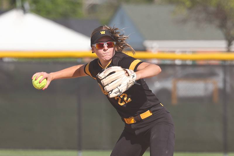 Joliet West’s Avery Houlihan throws to first for the out against Plainfield Central on Wednesday, May 15, 2024 in Joliet.