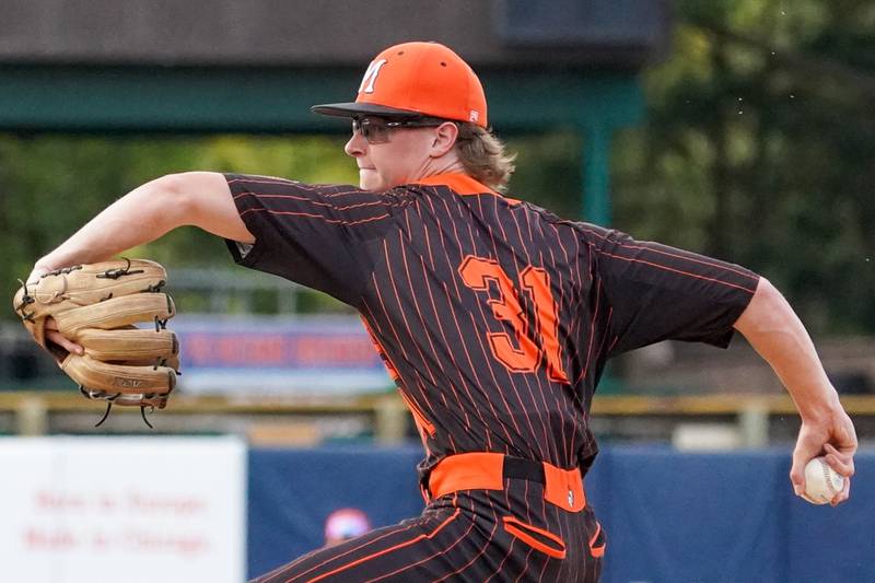 McHenry's Kaden Wasniewski (31) delivers a pitch against York during a class 4A Kane County supersectional baseball game at Northwestern Medicine Field in Geneva on Monday, June 3, 2024.