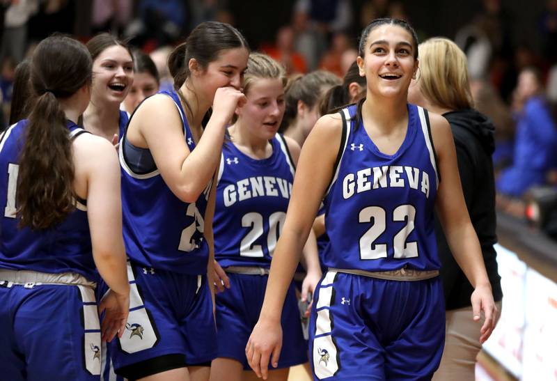 Geneva’s Leah Palmer reacts to making a half-court shot at the buzzer before halftime during a Class 4A Batavia Sectional semifinal game against St. Charles North on Tuesday, Feb. 20, 2024.