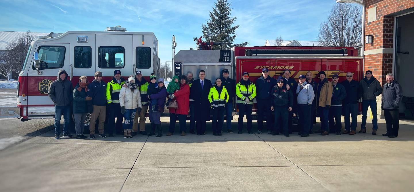 Sycamore city officials gathered for a group photo next to the city's newest fire engine on Jan. 17, 2024.