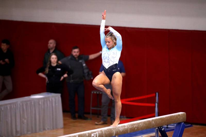 Lake Park’s Julia Bartnik competes on the balance beam during the IHSA Girls State Gymnastics Meet at Palatine High School on Friday, Feb. 16, 2024.