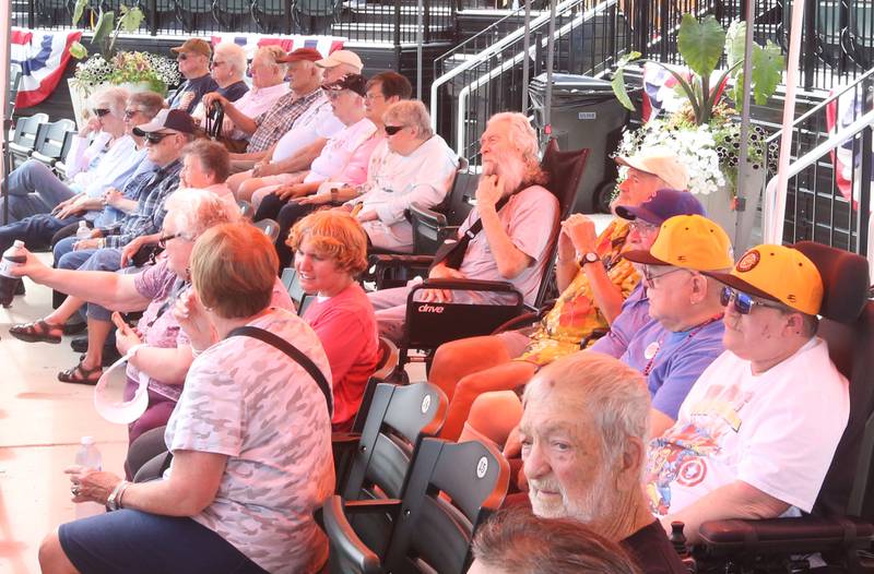 Veterans watch the Illinois Valley Pistol Shrimp take on the Danville Dans on Wednesday, July 3, 2024 in Schweickert Stadium at Veterans Park in Peru. The Pistol Shrimp held their annual Salute to Veterans honoring local members who served in the military.