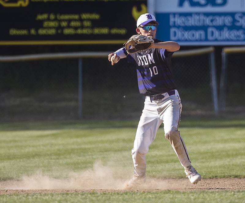 Dixon’s Bryce Feit throws a ball at short against Freeport Thursday, May 23, 2024 during the Class 3A regional semifinal in Dixon.