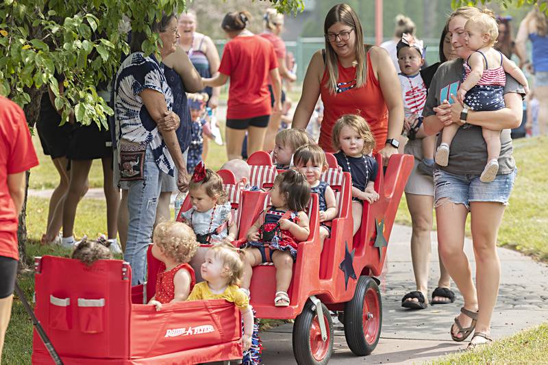Sterling Rock Falls Child Care held their annual Fourth of July parade on the grounds of the facility Thursday, June 29, 2023. Kids wore red, white and blue and other patriotic decor as they marched past parents and grandparents.