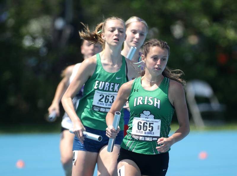 Seneca’s Gracie Steffes runs a leg of the 1A 4x800-meter relay during the IHSA State Track and Field Finals at Eastern Illinois University in Charleston on Saturday, May 20, 2023.