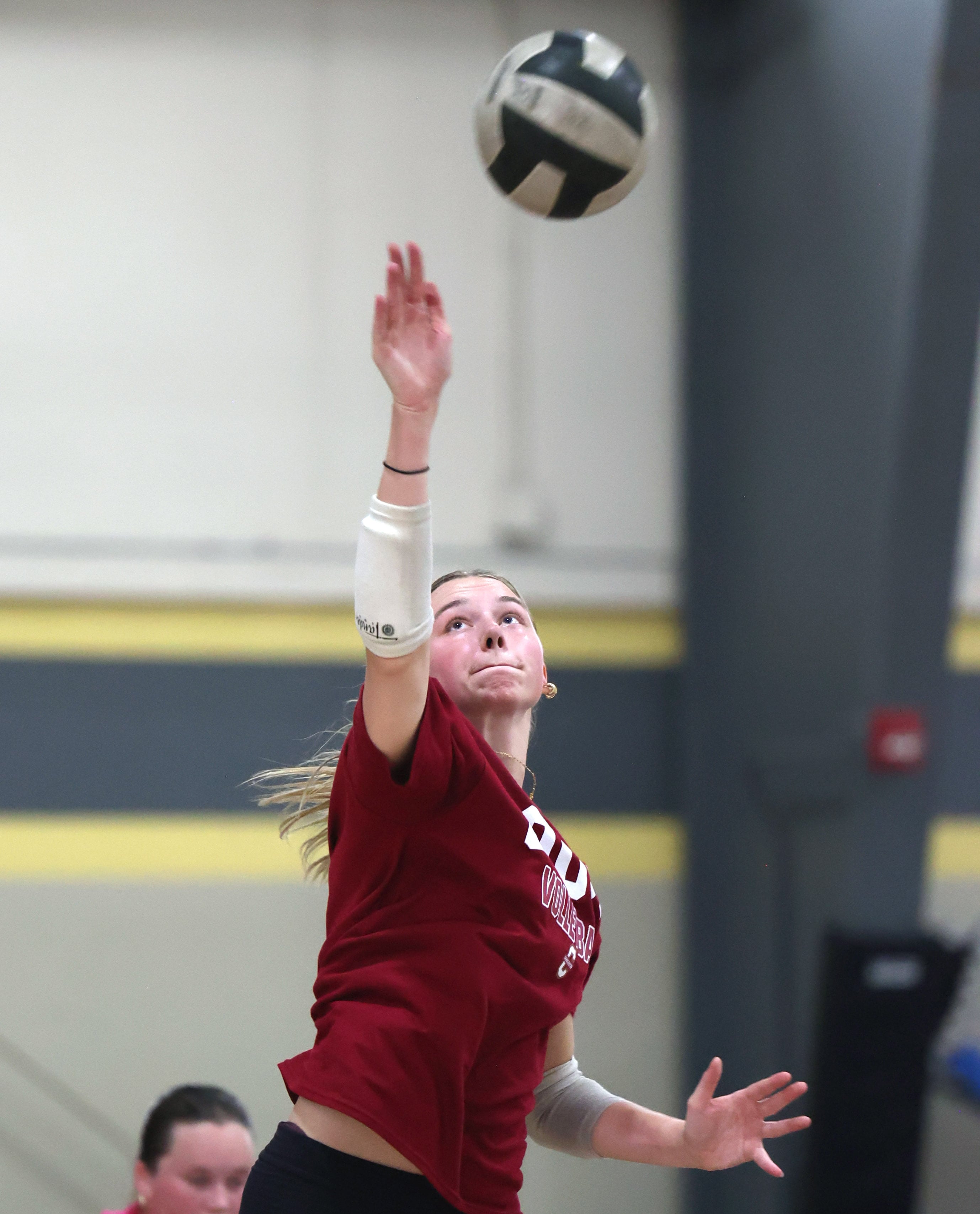 Ava Carpenter serves during a drill at Sycamore High School volleyball camp Tuesday, July 23, 2024, at Sycamore High School.