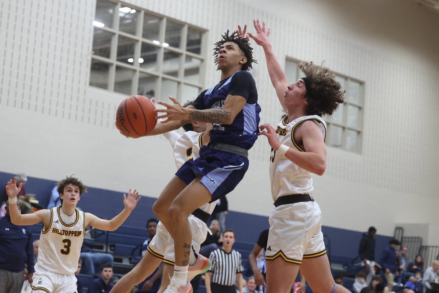 Plainfield South’s Armaan Hilton goes in for the layup against Joliet Catholic on Wednesday, Jan. 17th, 2024 in Joliet.