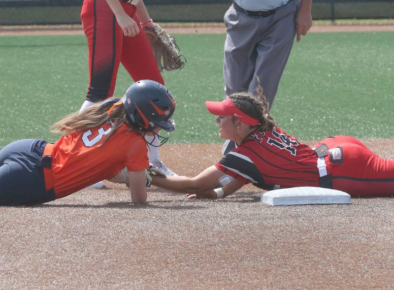 Oak Park-River Forest Anne Stine gets tagged out by Yorkville's Ella Fox while over running the bag during the Class 4A State semifinal softball game on Friday, June 9, 2023 at the Louisville Slugger Sports Complex in Peoria.