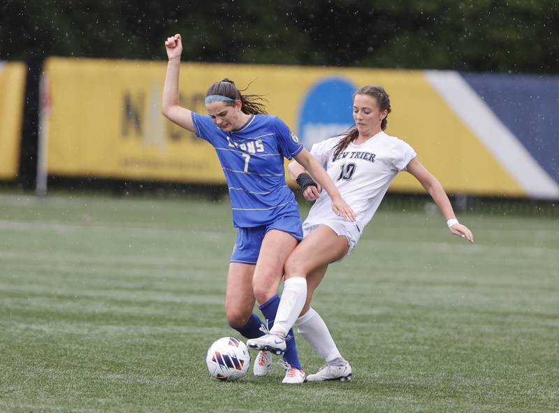 New Trier's Annie Paden (10) fights for the ball against Lyons' Caroline Mortonson (7) during the Class 3A Dominican super-sectional between New Trier and Lyons Township in River Forest on Tuesday, May 28, 2024.